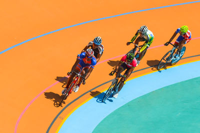 High angle view of people riding bicycle