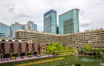 Modern buildings against sky in city