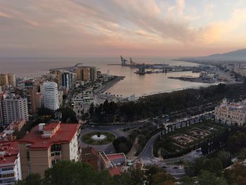 Aerial view of the port and the city of malaga in spain at sunset.