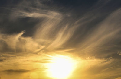 Low angle view of dramatic sky during sunset