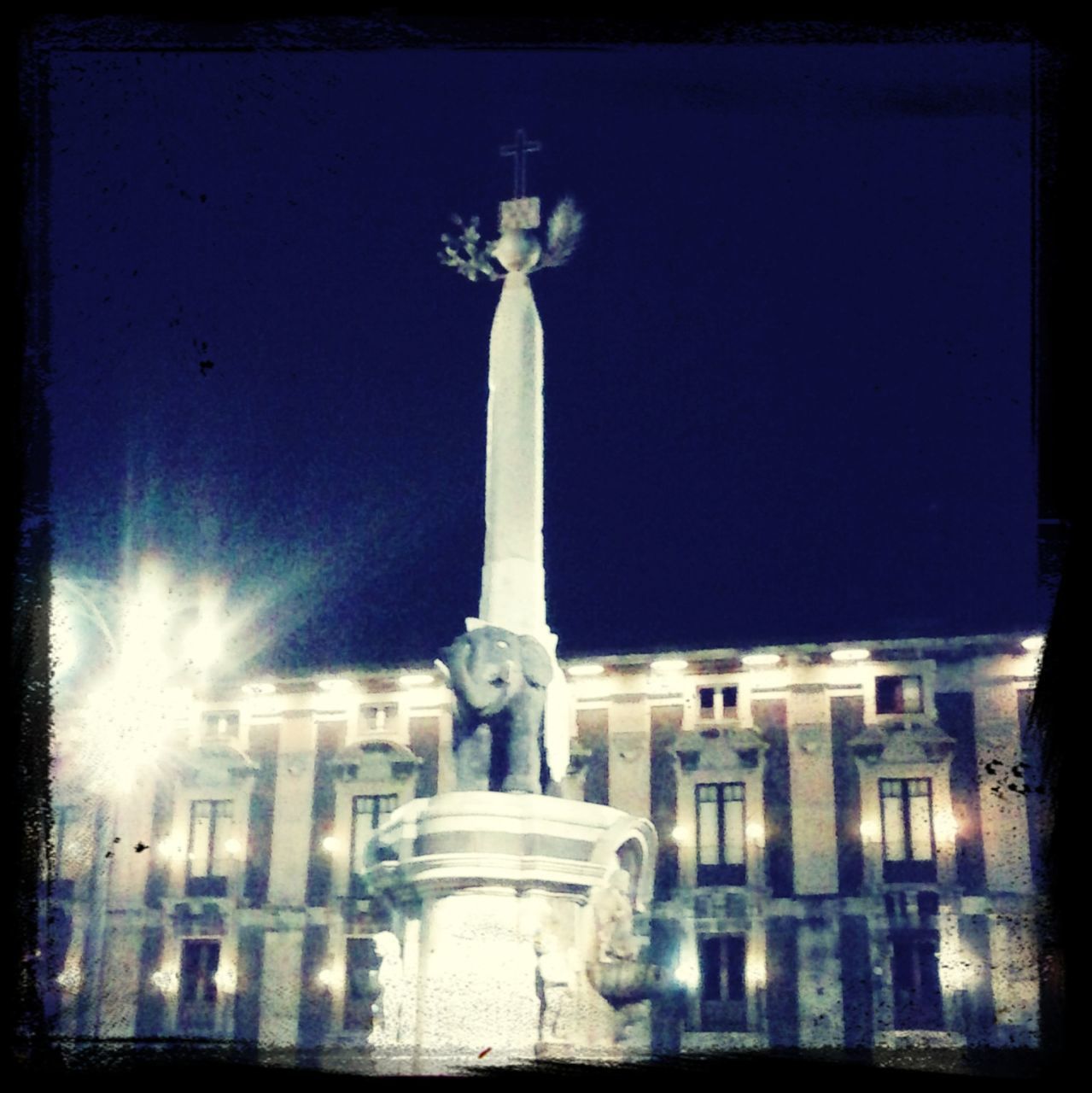 statue, sculpture, architecture, built structure, human representation, famous place, building exterior, travel destinations, religion, art and craft, transfer print, clear sky, spirituality, night, international landmark, auto post production filter, tourism, history, travel, art