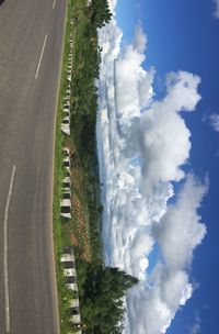 Road by sea against sky