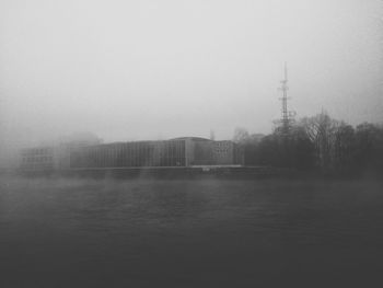 View of river in foggy weather