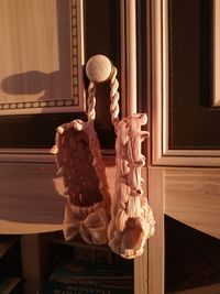 Close-up of sculpture on table at home