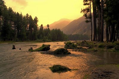 Scenic view of landscape against sky during sunset