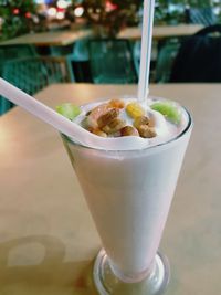 Close-up of drink served on table