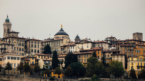View of cityscape against clear sky