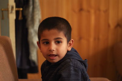 Portrait of cute boy at home