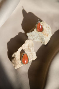 Close-up of wedding rings on table