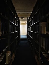 A row of bookshelves in the library. 