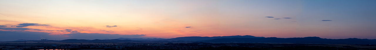 Scenic view of orange sky