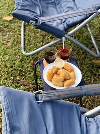 Low section of person sitting on table