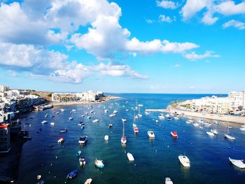 High angle view of boats moored in harbor