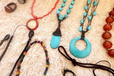High angle view of colorful jewelry for sale at store