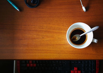 High angle view of coffee cup on table