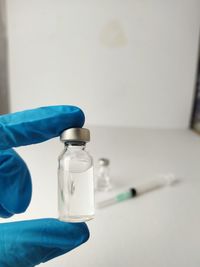 Close-up of scientist examining chemical in laboratory