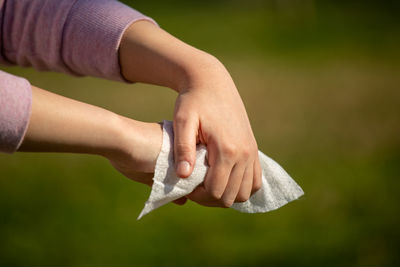 Close-up of woman holding hands