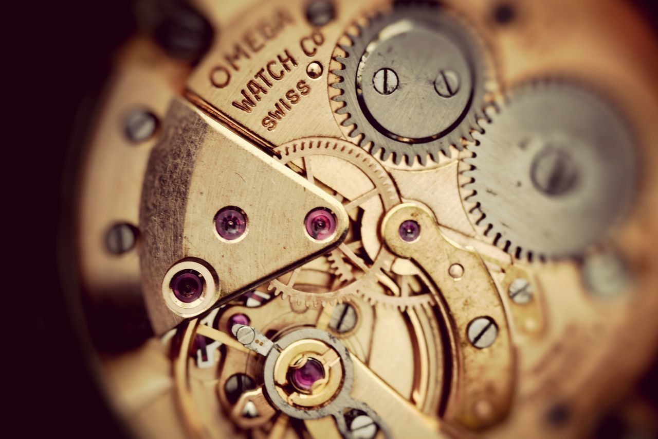 indoors, close-up, number, text, communication, selective focus, time, still life, western script, metal, technology, focus on foreground, single object, finance, accuracy, clock, wealth, circle, old-fashioned, coin