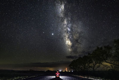 Scenic view of star field against sky at night