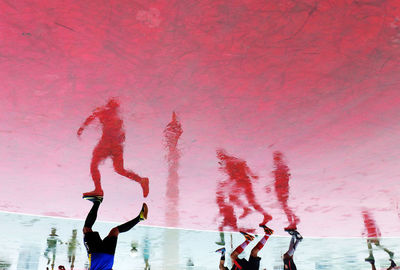 Group of people enjoying in water