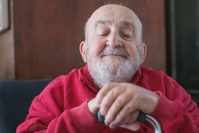 Close-up of senior man with tattoo