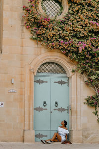 People at entrance of building