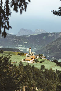 High angle view of building and mountains against sky