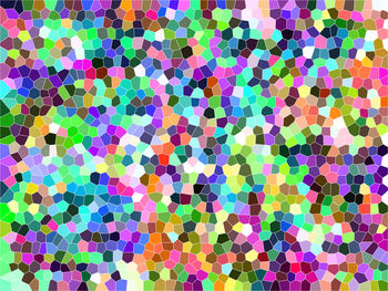 High angle view of multi colored umbrellas on tiled floor