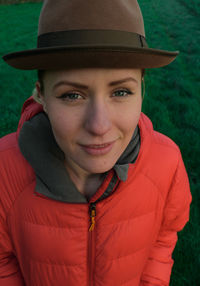 Portrait of smiling young woman on field