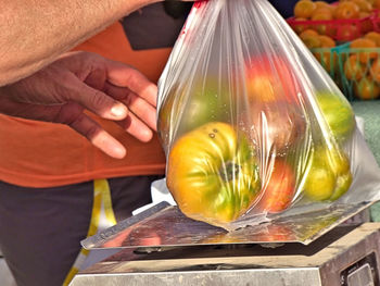 Midsection of man preparing food