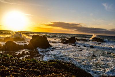 Scenic view of sea against sky during sunset