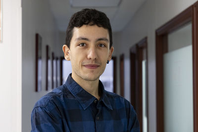 Portrait of young man looking away