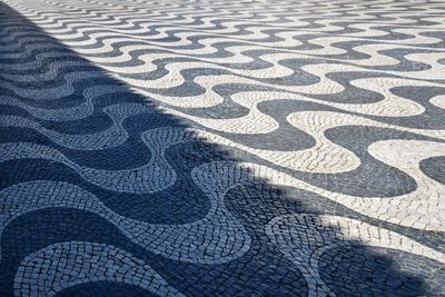 High angle view of shadow on floor