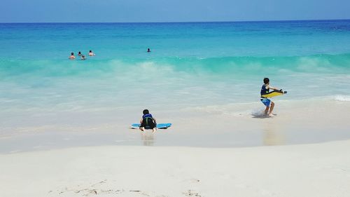 Tourists enjoying at beach