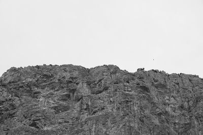 Low angle view of mountain against clear sky