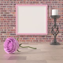 Pink rose on table against wall