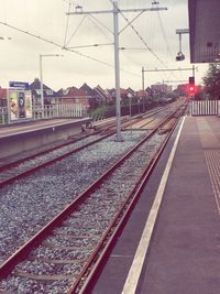 Railroad tracks on railroad station platform