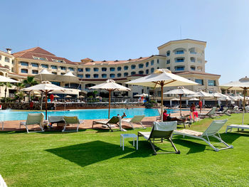 Group of people relaxing on swimming pool