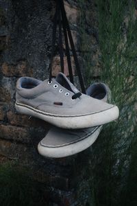 High angle view of shoes on snow covered land