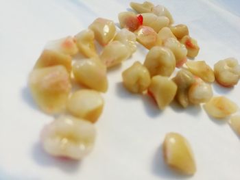 Close-up of fruits over white background