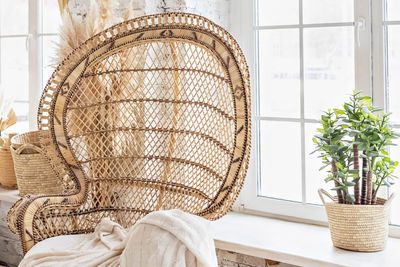 Wicker chair in the room.boho style interior.