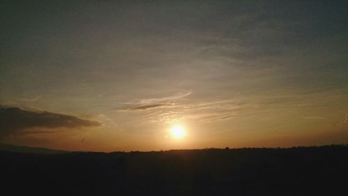 Scenic view of silhouette landscape against sky during sunset