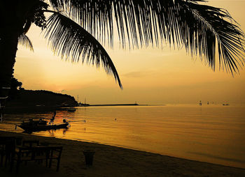 Scenic view of sea against sky at sunset