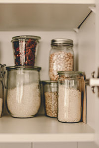 Close-up of drink in glass jar on table at home