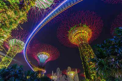 Low angle view of illuminated lights at night