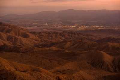 Aerial view of landscape against sky during sunset