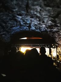 Silhouette of people at night