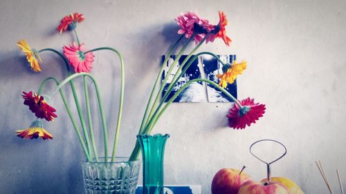 Close-up of red flowers in vase