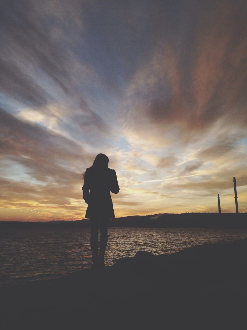 sunset, sea, silhouette, water, sky, horizon over water, standing, beach, orange color, scenics, leisure activity, beauty in nature, lifestyles, tranquility, cloud - sky, shore, tranquil scene, men