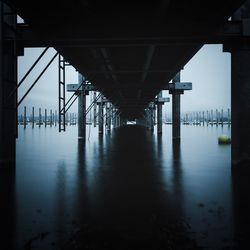 View of bridge over sea against sky